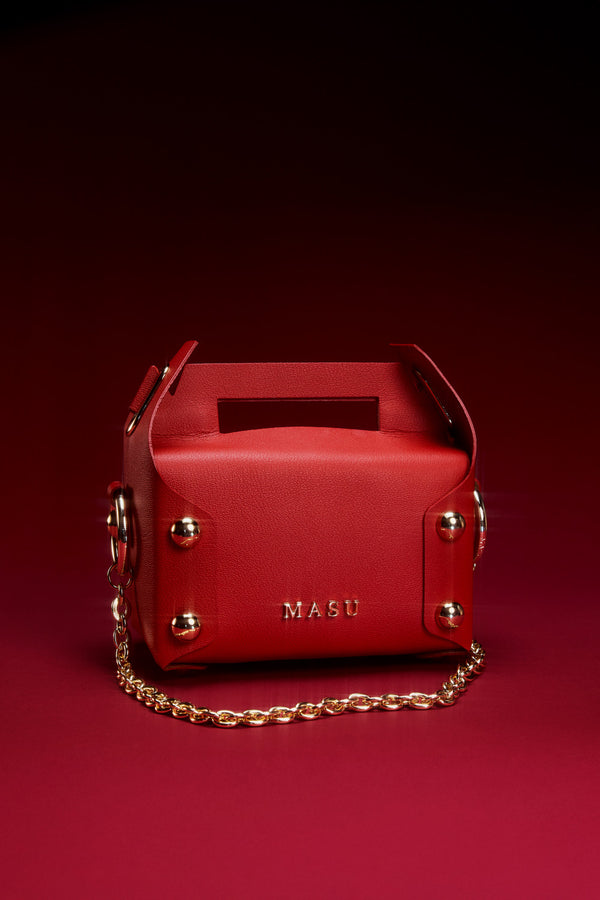 LEATHER CAKE BAG - HOLY RED / M25X1OJ002-MASU Official Online Store