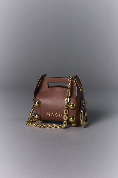 LEATHER CAKE BAG PETIT - CHOCOLATE / M26U6OJ007-MASU Official Online Store