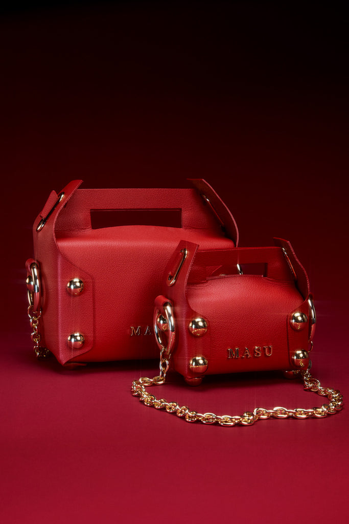 LEATHER CAKE BAG - HOLY RED / M25X1OJ002-MASU Official Online Store