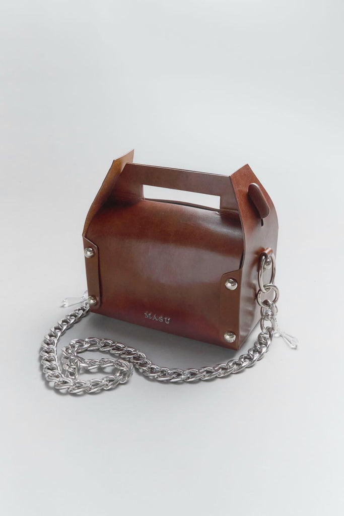 LEATHER CAKE BAG - BROWN / MPFW-OJ0524-MASU Official Online Store