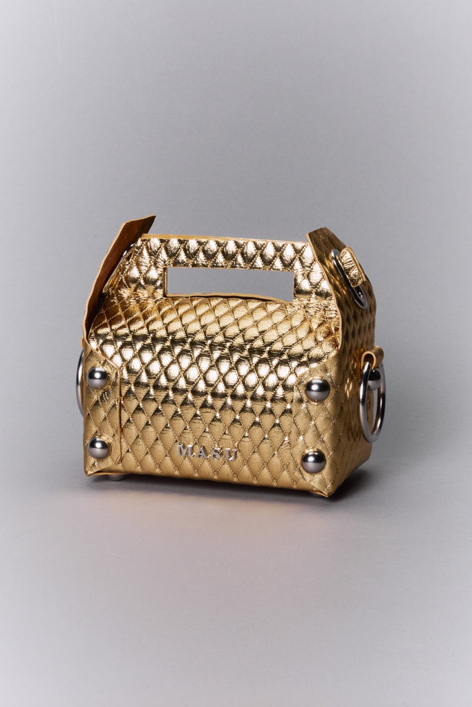 LEATHER CAKE BAG - GOLD / M25F9OJ008-MASU Official Online Store